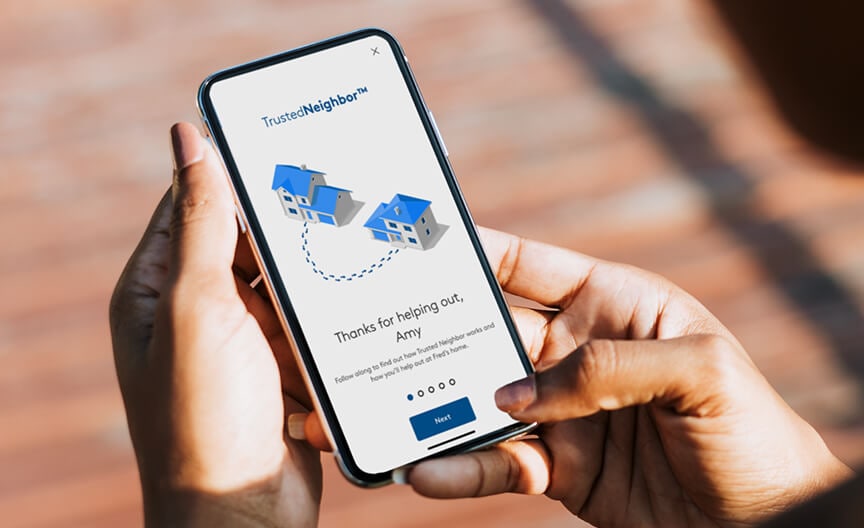 Image shows a customer checking Trusted Neighbor feature in the ADT+ App Image shows a customer checking Trusted Neighbor feature in the ADT+ App